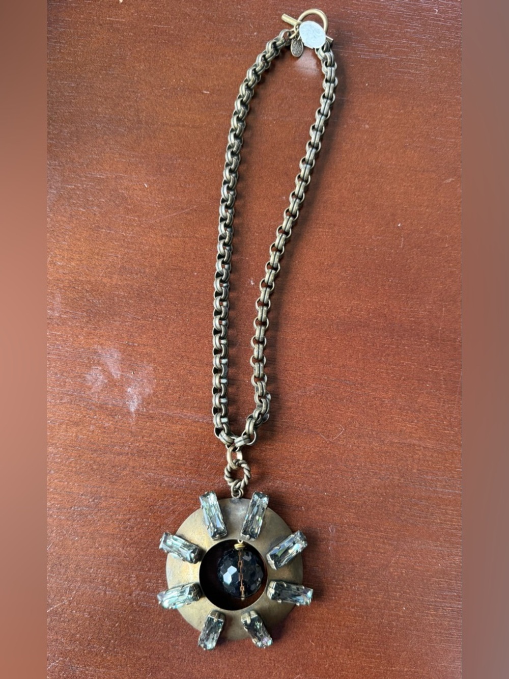 Aris Bronze-Tone Necklace with Black Center and Clear Stones